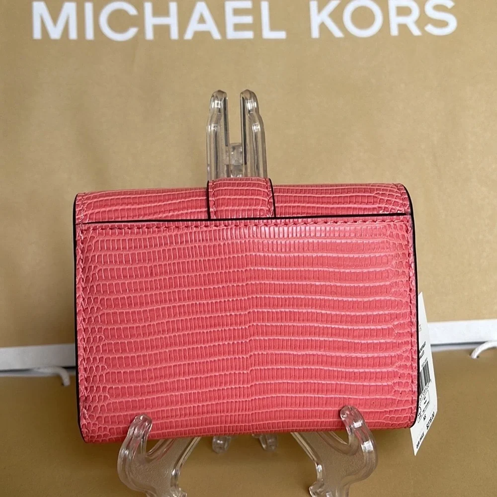 MICHAEL KORS CARMEN MEDIUM FLAP LOGO BIFOLD WALLET GRAPEFRUIT